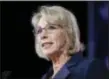  ?? TED S. WARREN, FILE - THE ASSOCIATED PRESS ?? In this Oct. 13 file photo, Education Secretary Betsy DeVos speaks during a dinner hosted by the Washington Policy Center in Bellevue, Wash. DeVos’ school choice agenda got a bit of a boost this week from the Republican tax bill, which would allow parents to use education savings accounts to pay tuition at private and religious elementary and secondary schools.