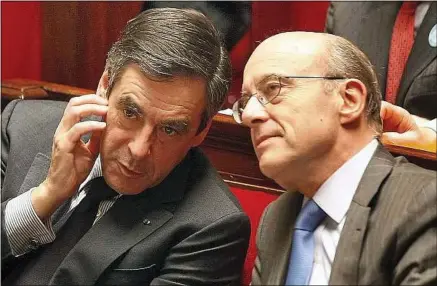  ??  ?? François Fillon et Alain Juppé ne partagent pas les mêmes points de vue sur la laïcité et l’immigratio­n.