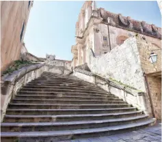  ??  ?? A picture shows the city’s baroque Jesuit staircase.