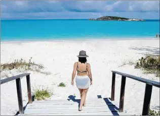  ?? PHOTOS STEVE MACNAULL/ SPECIAL TO THE SUN ?? The Tropic of Cancer Beach in the Bahamas is a slice of paradise that has to be experience­d.