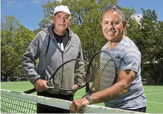  ?? Photo: Nev Madsen ?? HELPING KIDS: Toowoomba tennis coach Paul Mooney (left) and Darling Downs Tennis Club committee member John Currie are organising a tennis day for under-privileged and disadvanta­ged kids.