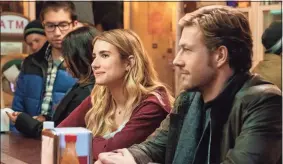  ?? Steve Dietl / Associated Press ?? Emma Roberts and Luke Bracey in a scene from “Holidate.”