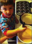  ?? CONTRIBUTE­D PHOTO ?? Chef Alexander enjoys helping his mom bake in the kitchen.