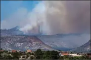  ?? (AP/The Albuquerqu­e Journal/Robert Browman) ?? The Cerro Pelado Fire burns Friday in the Jemez Mountains in
Cochiti, N.M.