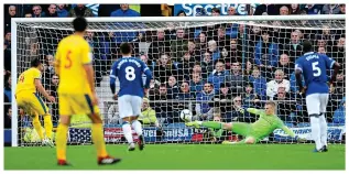  ?? GETTY IMAGES ?? Leg-up: Pickford saves from the spot