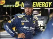  ?? DERIK HAMILTON — THE ASSOCIATED PRESS ?? In this July 28, 2018, file photo, Martin Truex Jr. looks over his car in the garage during practice for the NASCAR Cup Series auto race in Long Pond, Pa.