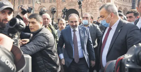  ??  ?? Armenian Prime Minister Nikol Pashinian meets with his supporters gathered on Republic Square in downtown Yerevan, Armenia, Feb. 25, 2021.