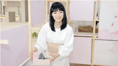  ??  ?? Japanese organizati­onal expert Marie Kondo introduces her new line of storage boxes during a media event in New York.