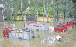  ?? PTI ?? A flooded fire service station after heavy rains in Jammu on Wednesday.