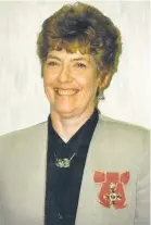  ??  ?? Proud Sheila with her MBE in 1995