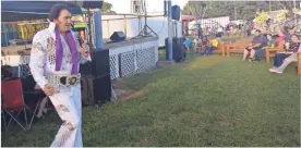  ?? / Sean Williams ?? “Elvis” took to the Fairground­s stage during a Thursday, Aug. 30 performanc­e.