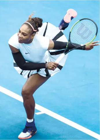  ?? (AP FOTO) ?? PLUNGING INTO ACTION. Serena WIlliams ends a four-month rest with a win over Pauline Parmantier in the first round of the SB Classic.