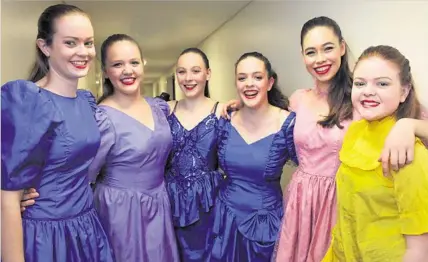  ?? PHOTOS: BEV LACEY ?? FANCY DRESS: Dressed in some crazy costumes for a dance piece at the Droughtbus­ter concert are St Ursula’s students (from left) Bridget Webster, Mikaela Maurer, Renae Bruggemann, Sophie McHardy, Lucy Hood and Adrianna Williamson.