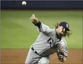  ?? LYNNE SLADKY — THE ASSOCIATED PRESS ?? Rays pitcher Ryne Stanek delivers a pitch during Wednesday’s game against the Marlins in Miami.