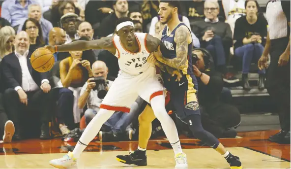  ?? JACK BOLAND ?? Raptors forward Pascal Siakam looks to get past the New Orleans Pelicans’ Lonzo Ball during their game Tuesday in Toronto. Siakam scored 34 points and added 18 rebounds.