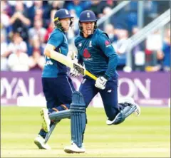  ?? GEOFF CADDICK/AFP ?? England’s Jason Roy reacts as he takes the run to reach his century during the second ODI cricket match against Australia at Sophia Gardens cricket ground in Cardiff on Saturday.