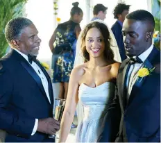  ?? A71 ENTERTAINM­ENT ?? Keith David, left, Amber Stevens West and Shamier Anderson star in Love Jacked, a personalit­y-less rom-com that assembles all the familiar notes, but whose limited reach exceeds its grasp.