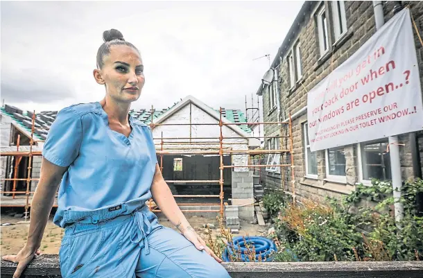  ?? ?? DISPUTE: Beauty business owner Niki Caira is now seeking a lawyer after becoming embroiled in a row over new housing next to her home.