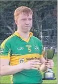  ?? ?? Castleyons GAA U18 captain Matthew Rosner, with the league cup.