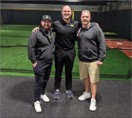  ?? PHOTO BY HALEY SAWYER ?? From left, coach Nick Milone, founder Dave Coggin and business partner Mark Magna help open the PFA Sports baseball training facility in Van Nuys.