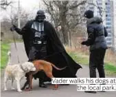  ??  ?? Vader walks his dogs at
the local park.