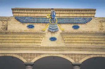  ??  ?? The Faravahar, one of the most well-known symbols of Zoroastria­nism, an Iranian religion, can be seen on a historical building in Yazd, Iran.