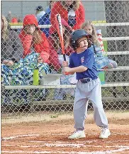  ?? / kevin Myrick ?? Little league players got out onto the field early on Saturday morning, March 16, and didn’t mind the chill weather when up to bat.