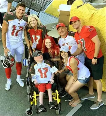  ?? Doug Watson ?? A Buccaneers preseason game against the Steelers at Heinz Field in 2019 allowed for a quick Watson family reunion. PIctured clockwise from upper left: Justin, his mother Terri, sister Abby, father Doug, brother Alex, sister-in-law Marisa and brother Tommy.