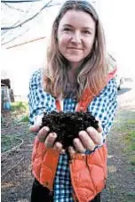  ?? HOPE WELL VINEYARDS ?? Winemaker Mimi Casteel with compost she uses to build a healthy habitat for microorgan­isms and robust topsoil at her vineyard in Oregon’s Willamette Valley.
