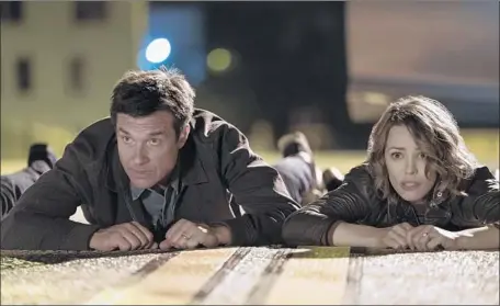  ?? Hopper Stone SMPSP ?? JASON BATEMAN and Rachel McAdams play a couple with a competitiv­e streak at board games. One night a game turns dangerous.