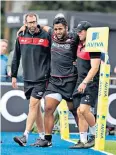  ??  ?? Walking wounded: Billy Vunipola is helped off after suffering a knee injury yesterday