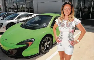  ?? Dave Rossman photos ?? Heather Cline-Wehrly sports a manicure with the McLaren “swoosh” next to her 650S at McLaren Houston. Cline-Wehrly and other supercar owners headed to the Senna: Driving Instinct event in Austin.