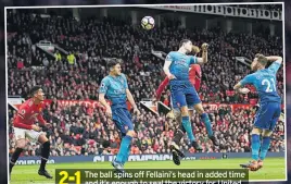  ??  ?? 2-1 The ball spins off Fellaini’s head in added time and it’s enough to seal the victory for United