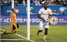  ?? GRAHAM HUGHES / THE CANADIAN PRESS ?? Montreal goalkeeper Evan Bush looks on after a score by Josef Martinez on Saturday. Martinez got his 23rd and 24th goals of the year.