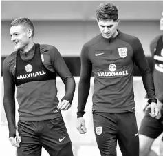  ??  ?? England’s Jamie Vardy and John Stones during training session at St. George’s Park in Burton Upon Trent, Britain. — Reuters photo