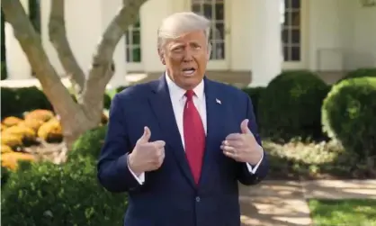  ??  ?? Donald Trump speaking about his Covid-19 treatment outside the White House. Photograph: The White House/Reuters