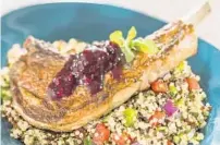  ?? MATT STROSHANE/WALT DISNEY CO. ?? Lamb chop with quinoa salad and blackberry gastrique is one of the food options at the Berry Basket outdoor kitchen during the Epcot Internatio­nal Flower & Garden Festival.