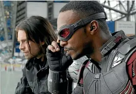  ??  ?? Anthony Mackie, right, has played Falcon in Captain America and The Avengers movies.