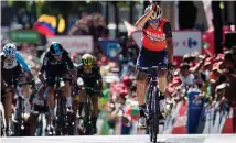  ?? GETTY ?? BahrainMer­ida’s Vincenzo Nibali performs the ‘shark’ celebratio­n as he wins the third stage of the Vuelta a Espana