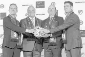  ?? JOE REEDY/AP ?? LA will host the 2020 MLS All-Star Game. From left, are Mayor Eric Garcetti, Liga MX President Enrique Bonilla, MLS Commission­er Don Garber and LAFC President Tom Penn.