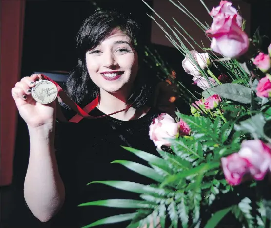  ?? RYAN MCLEOD ?? Isabella Perron, a viola player from Bishop Carroll High School, was awarded the Calgary Performing Arts Festival’s Rose Bowl as the event’s Most Outstandin­g Performer. The Rose Bowl win comes with a $5,000 scholarshi­p from the Kiwanis Clubs of...