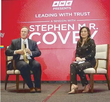  ??  ?? Stephen (with Karen Davila) explains how trust can have an economic impact on organizati­ons