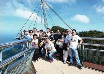  ??  ?? Relaxing time: The 30 guests at Langkawi Island enjoying their trip.