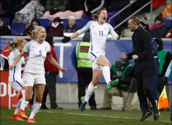  ??  ?? England forward Ellen White (right) celebrates with teammates after scoring a goal on the United States during the second half of a SheBelieve­s Cup women’s soccer match Saturday in Harrison, N.J. England won, 1-0. AP PHOTO