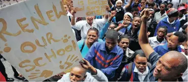  ?? Picture: DAVID RITCHIE ?? PROTEST: Uitzig High pupils marched to the Western Cape Provincial Legislatur­e to hand over a memorandum to keep their school open. The Western Cape Education Department planned to close it as vandalism made it unsafe.