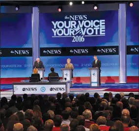  ?? The New York Times/RICHARD PERRY ?? Bernie Sanders (left), Hillary Clinton and Martin O’Malley face the debate moderators Saturday night at Saint Anselm College in Manchester, N.H.