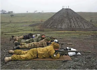  ?? Foto Anastasia Vlasova/Reuters ?? Napetosti na ukrajinski meji z Rusijo močno zaostrujej­o tudi odnose med svetovnimi velesilami.