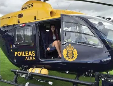  ??  ?? Flying squad: Ex-Nationalis­t MP Tasmina Ahmed-Sheikh on the police helicopter in 2015