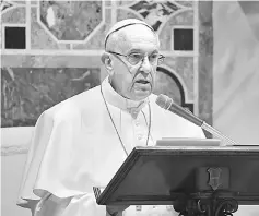  ?? — Reuters photo ?? Pope Francis makes his speech during an audience with the diplomatic corps accredited to the Holy See for the traditiona­l exchange of New Year greetings at the Vatican.