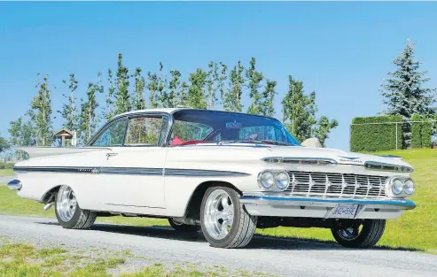  ?? CAM HUTCHINS/DRIVING.CA ?? Despite audacious car styling reigning supreme in the late fifties, Cam’s favourite car of the era is the 1959 Chevy Impala, this fine example spotted at last weekend’s Father’s Day in the Park show in Mission.